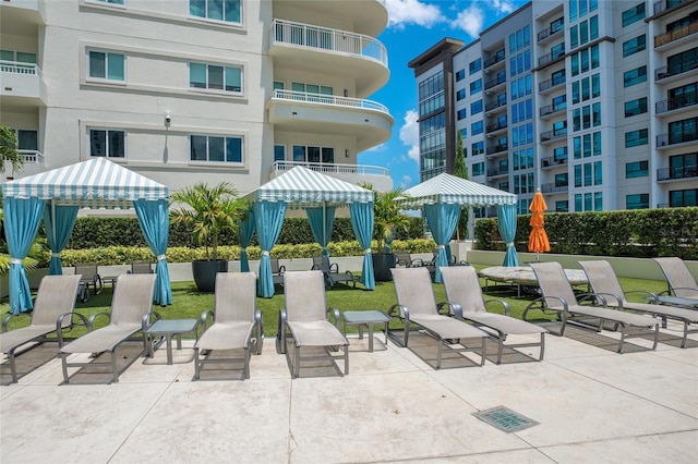 view of community featuring a gazebo and a patio