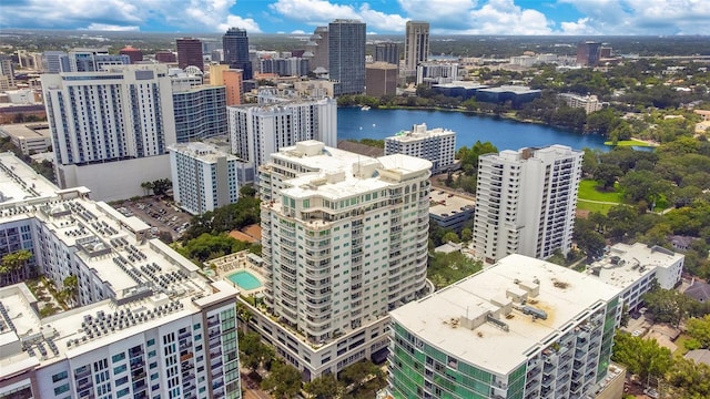 birds eye view of property with a water view