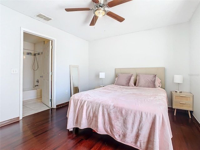 bedroom with hardwood / wood-style floors, ensuite bath, and ceiling fan