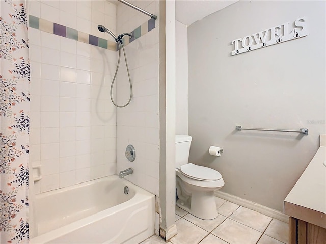 full bathroom with tile patterned flooring, vanity, shower / tub combo, and toilet