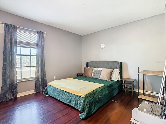 bedroom featuring dark wood-type flooring