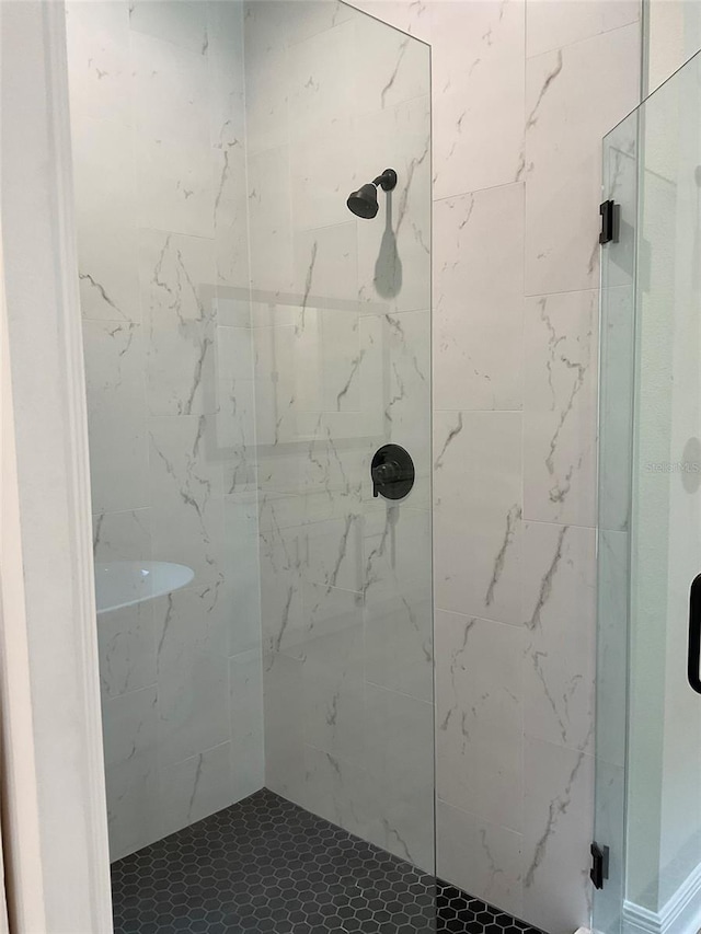 bathroom featuring a stall shower