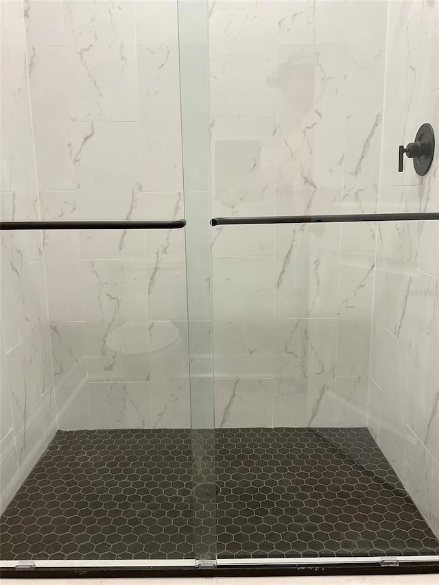 bathroom with a stall shower