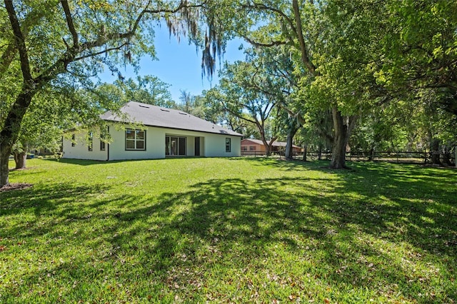 view of yard featuring fence