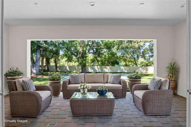 view of patio / terrace featuring outdoor lounge area and a fenced backyard