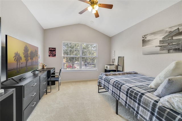 carpeted bedroom with ceiling fan and lofted ceiling