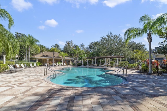 view of pool featuring a patio