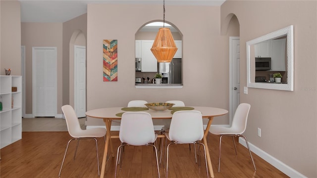 dining room featuring light wood-type flooring