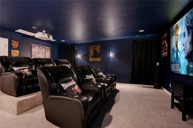 carpeted cinema with a textured ceiling