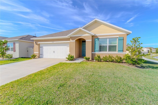 ranch-style house with a front yard and a garage