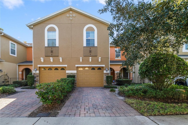 view of front of property with a garage