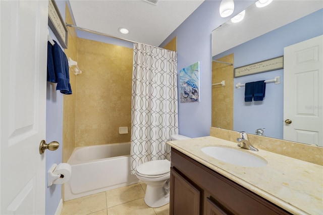 full bathroom featuring tile patterned floors, shower / bath combo, toilet, and vanity