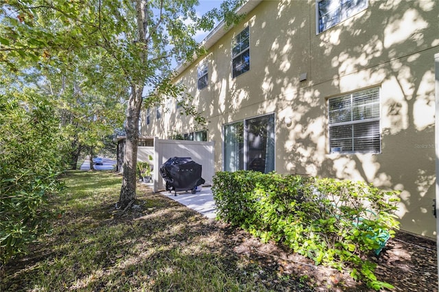 back of property featuring a patio