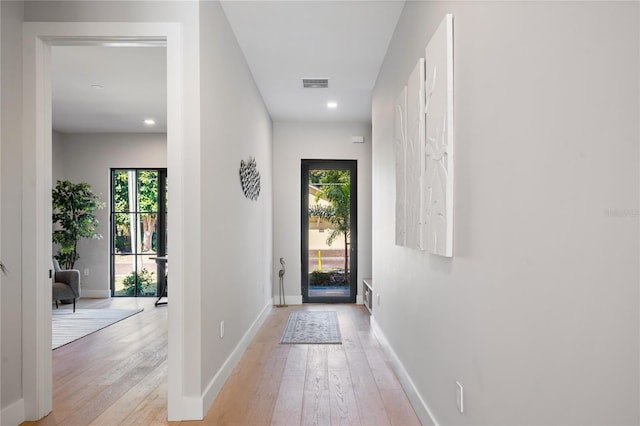 doorway featuring light hardwood / wood-style floors