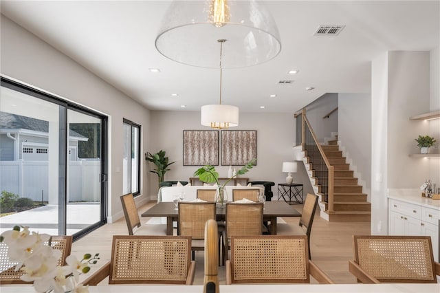 dining room featuring light hardwood / wood-style flooring