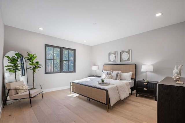 bedroom featuring light hardwood / wood-style floors