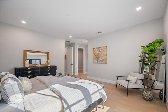 bedroom featuring light hardwood / wood-style flooring