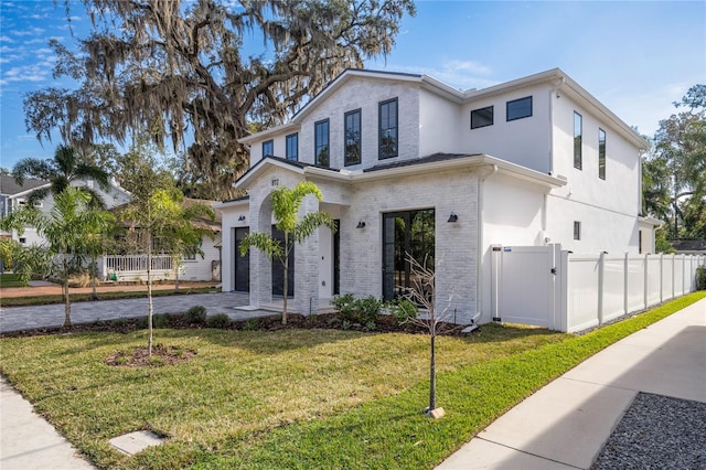 view of front of home with a front yard