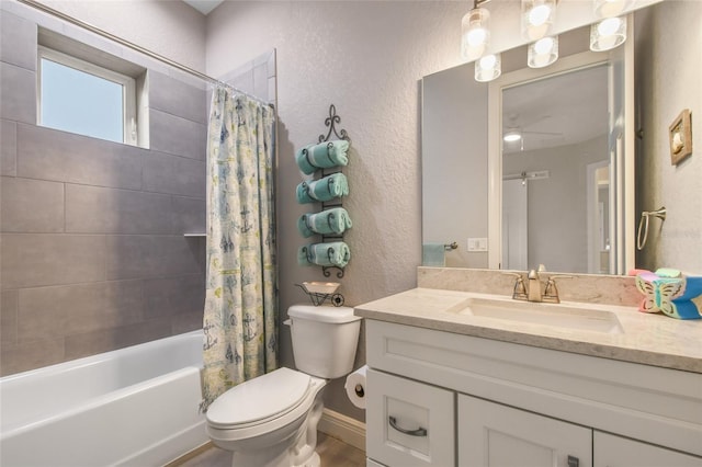 full bathroom with vanity, ceiling fan, shower / bathtub combination with curtain, and toilet