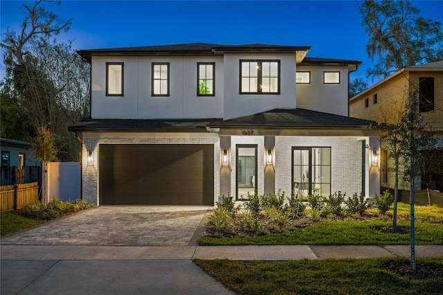 view of front of property featuring a garage