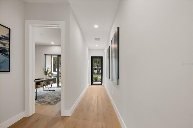 hall featuring light hardwood / wood-style floors