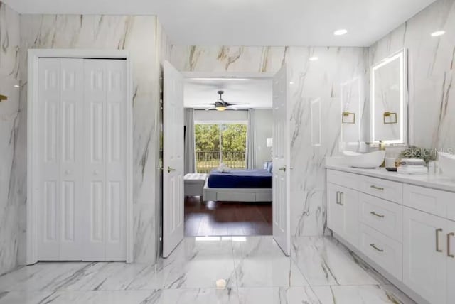 bathroom with vanity and ceiling fan