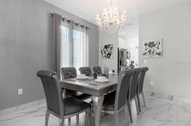 2912 Sunset Lakes Blvd, Kissimmee, FL 34747 - dining space featuring a chandelier, light marble finish flooring, and baseboards