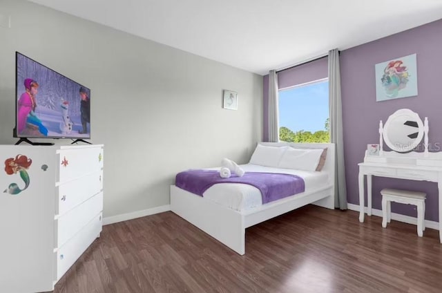 bedroom featuring dark hardwood / wood-style floors