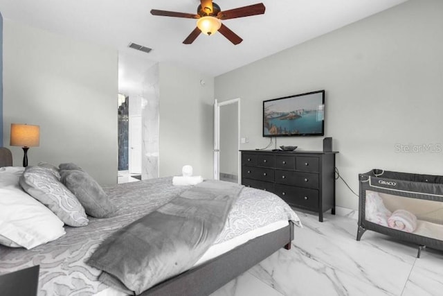 bedroom with ceiling fan and ensuite bathroom