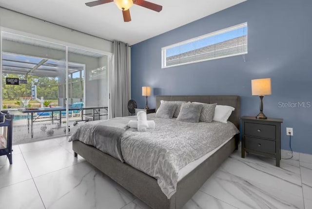 bedroom featuring ceiling fan and multiple windows