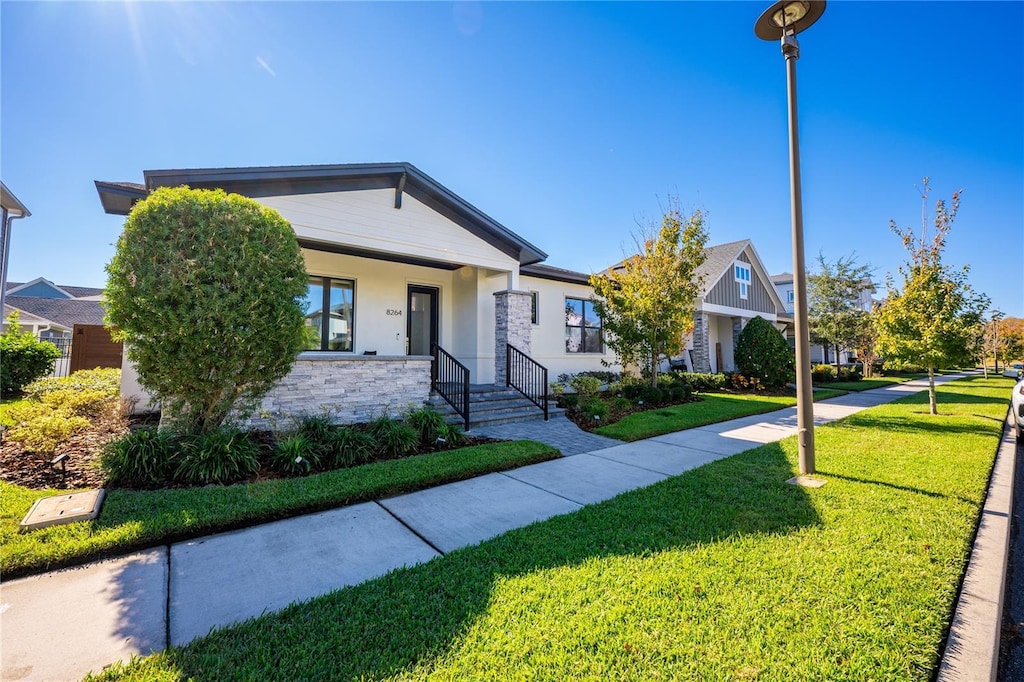 view of front of house with a front lawn