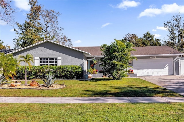 single story home with a front yard and a garage