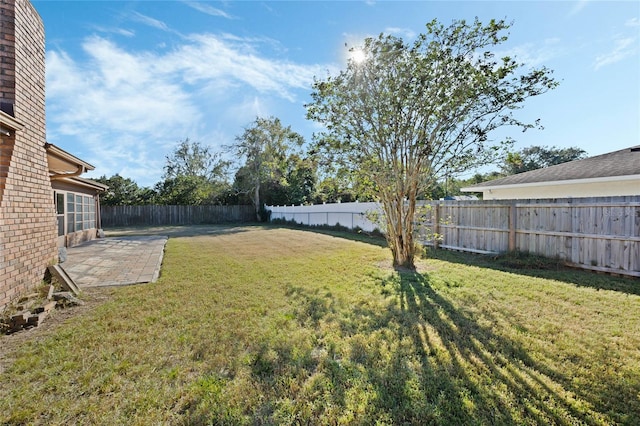 view of yard with a patio area