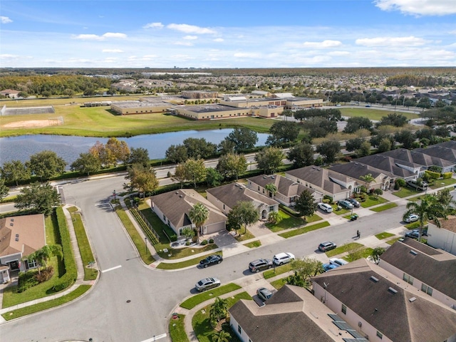 bird's eye view featuring a residential view and a water view