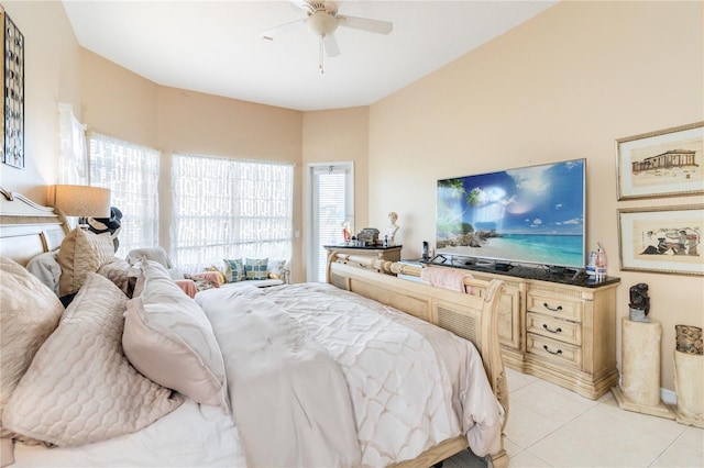 tiled bedroom with ceiling fan