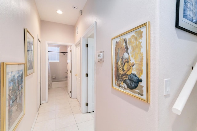 hall with light tile patterned flooring