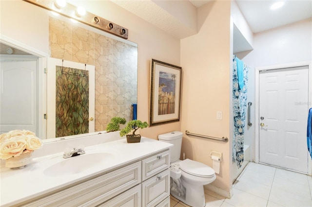 full bathroom with tile patterned floors, toilet, shower / tub combo, and vanity