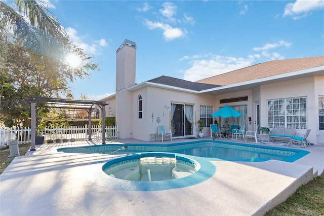 view of swimming pool with a pergola, a patio, and an in ground hot tub