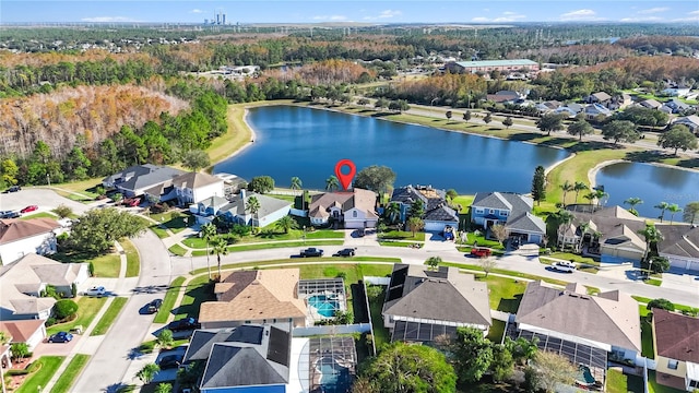 birds eye view of property featuring a water view