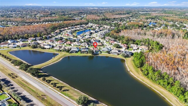 drone / aerial view with a water view