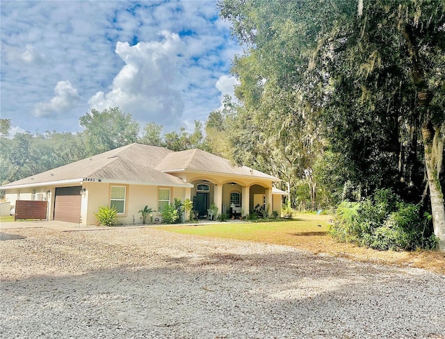 view of front of property with a garage