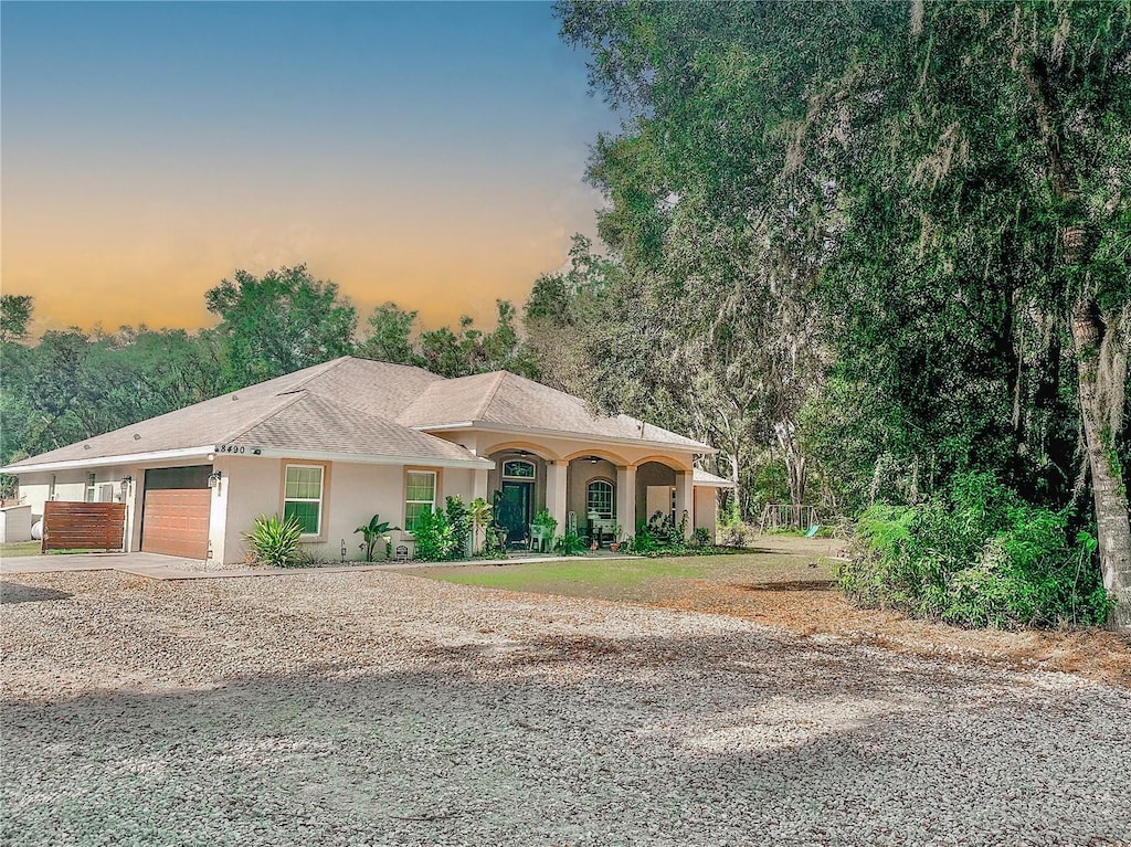 view of front of property featuring a garage