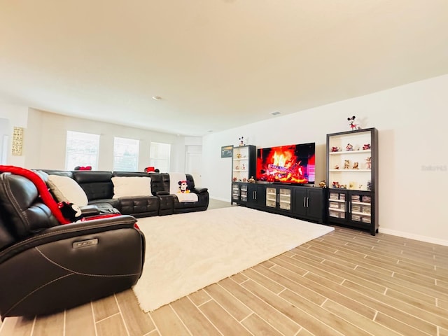 living room with light hardwood / wood-style floors