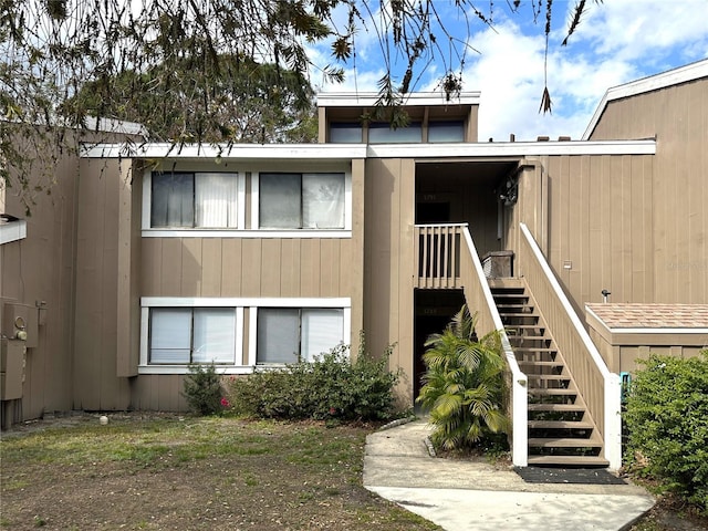 view of property with stairs