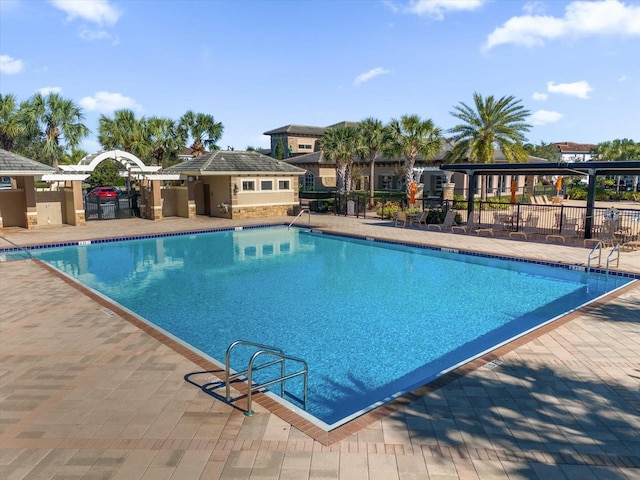 view of swimming pool featuring a patio