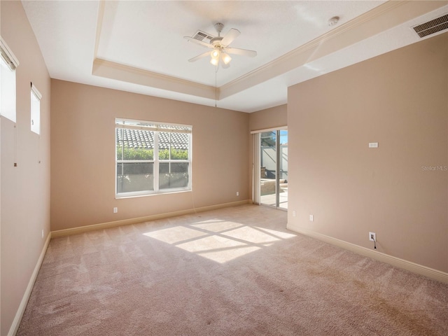 8320 Via Bella Notte, Orlando, FL 32836 - carpeted spare room featuring a raised ceiling, ceiling fan, and a smoke detector