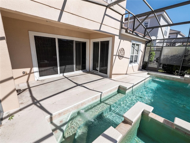 view of pool featuring a patio and a lanai