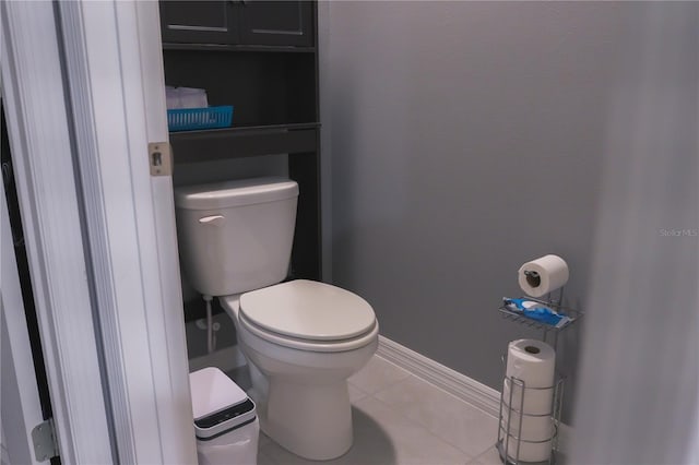 bathroom featuring tile patterned floors and toilet