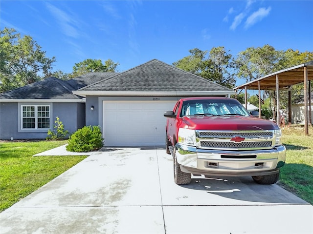 view of front of home with a garage and a front yard