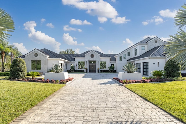 view of front of home with a front yard